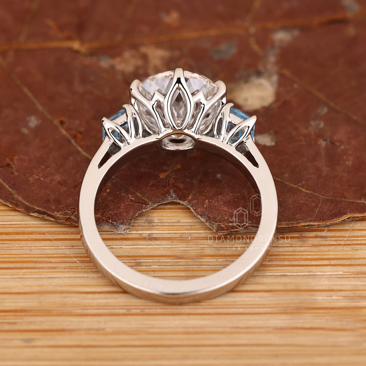 Lab grown Portuguese diamond ring with cathedral style setting.
