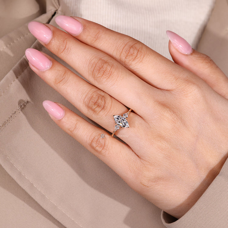 Marquise cut ring with v shape prong setting.