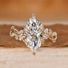 Marquise diamond ring with marquise and round side stones.