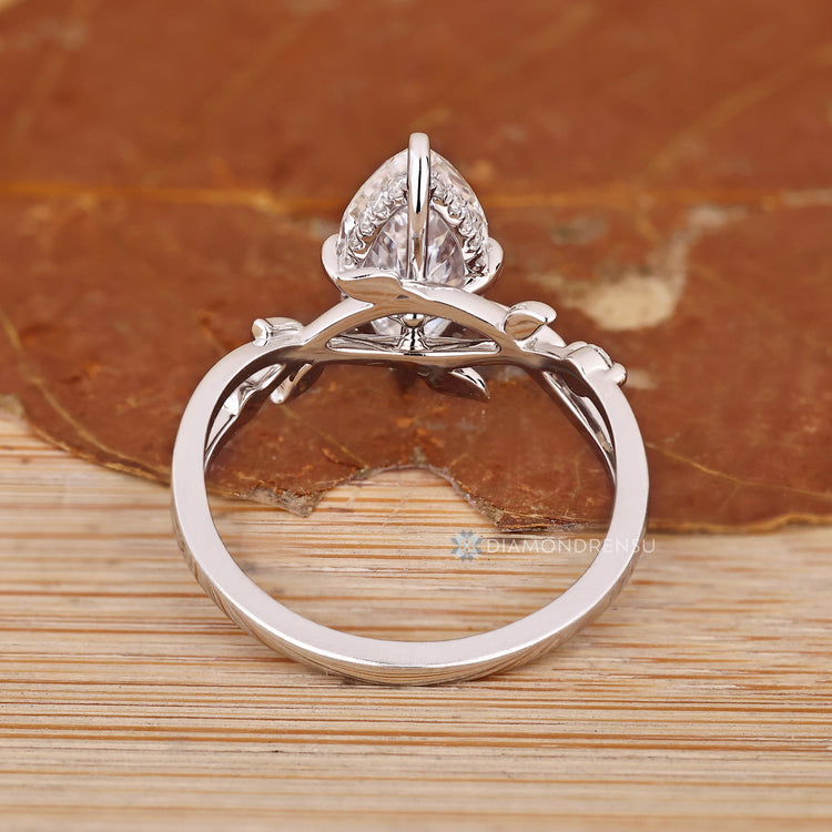 Lab grown marquise diamond ring with compass prong setting.