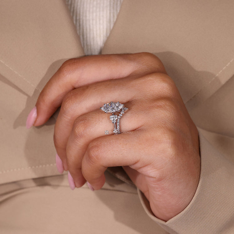 Marquise ring set with vintage style and milgrain details.