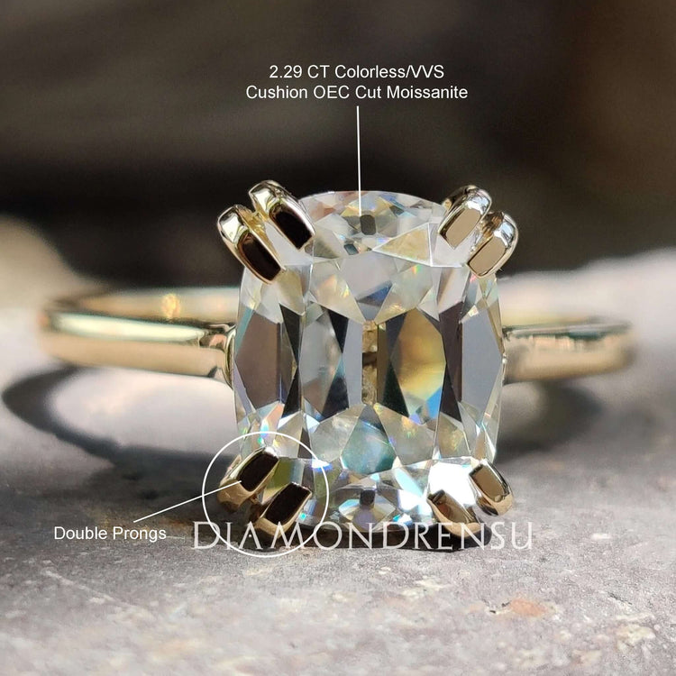 Handmade jewelry with cushion old European cut moissanite.
