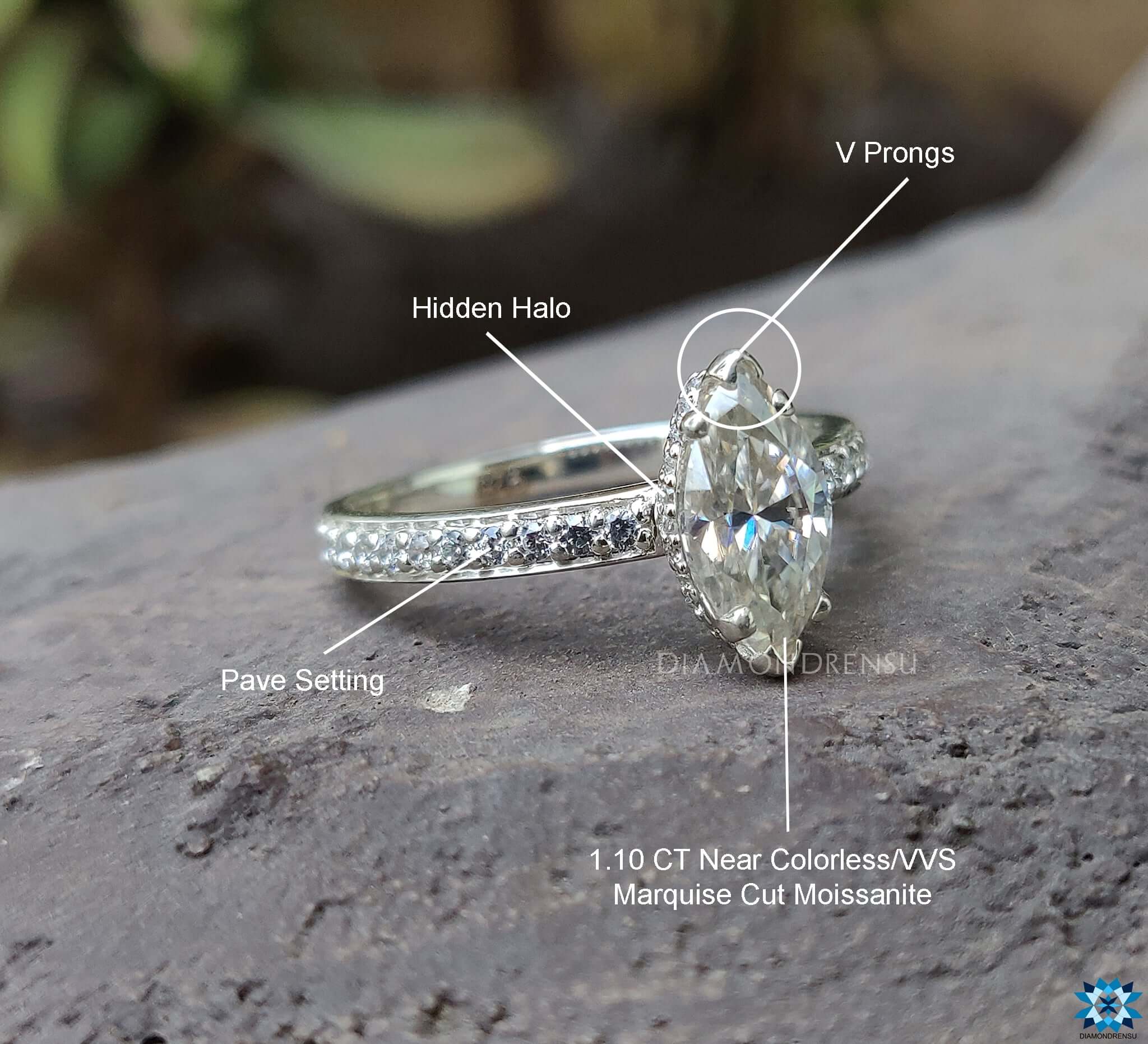 Handmade jewelry featuring a stunning marquise Moissanite ring with pave setting.