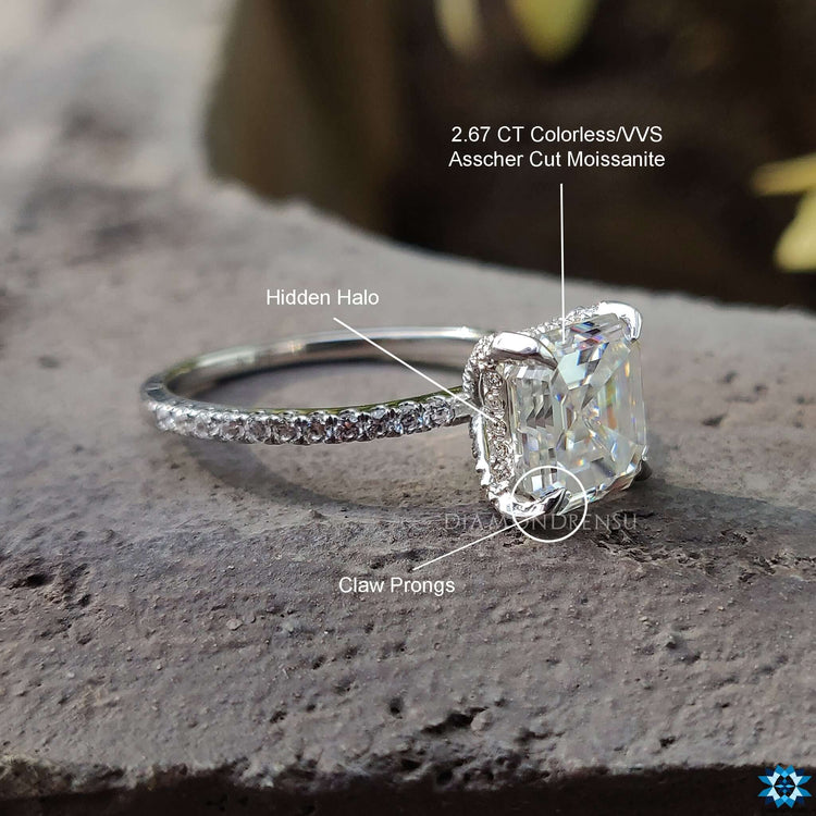 Handmade jewellery piece with hidden halo Asscher cut Moissanite and pave accents.
