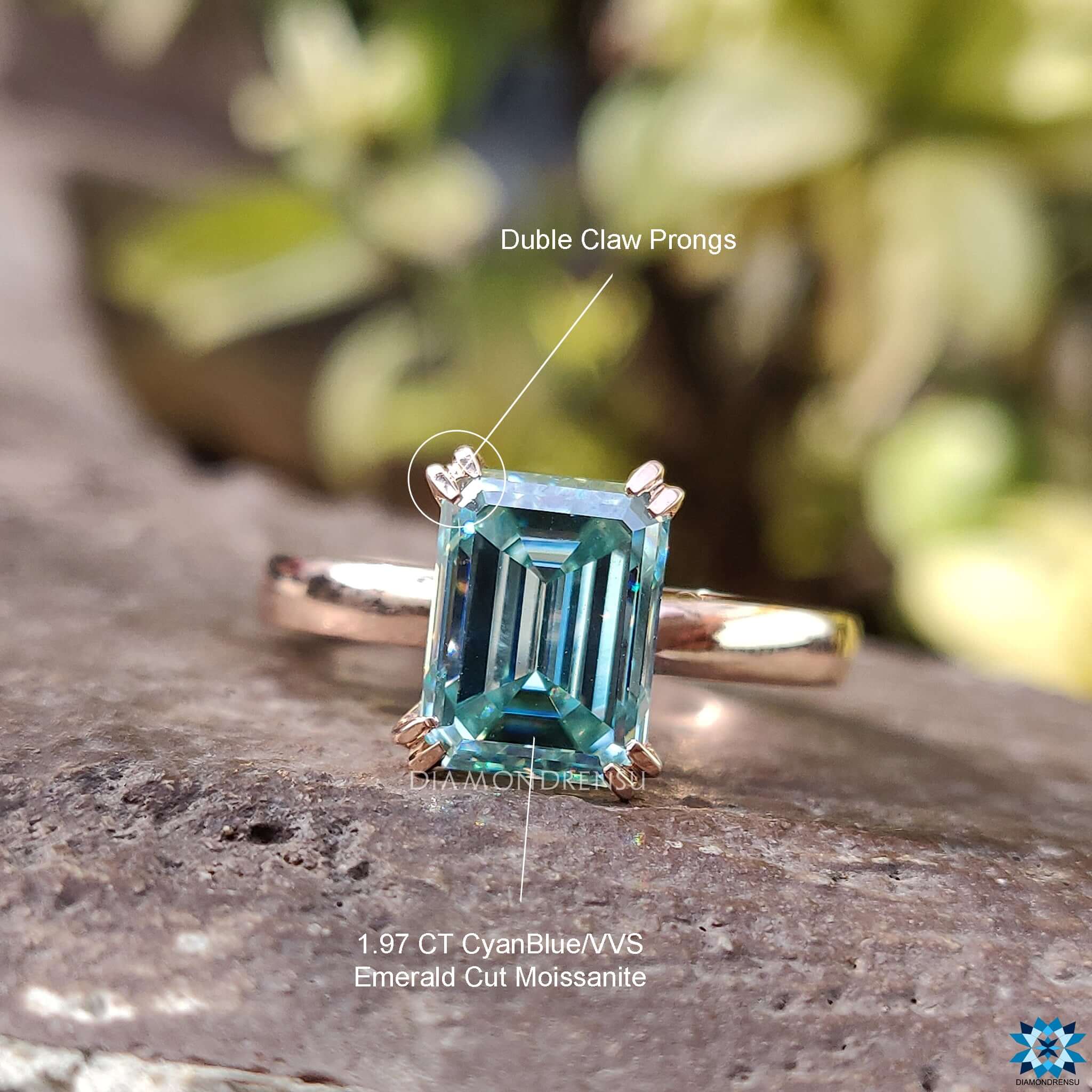 Handmade ring with a unique emerald cut moissanite centre for a timeless appeal.