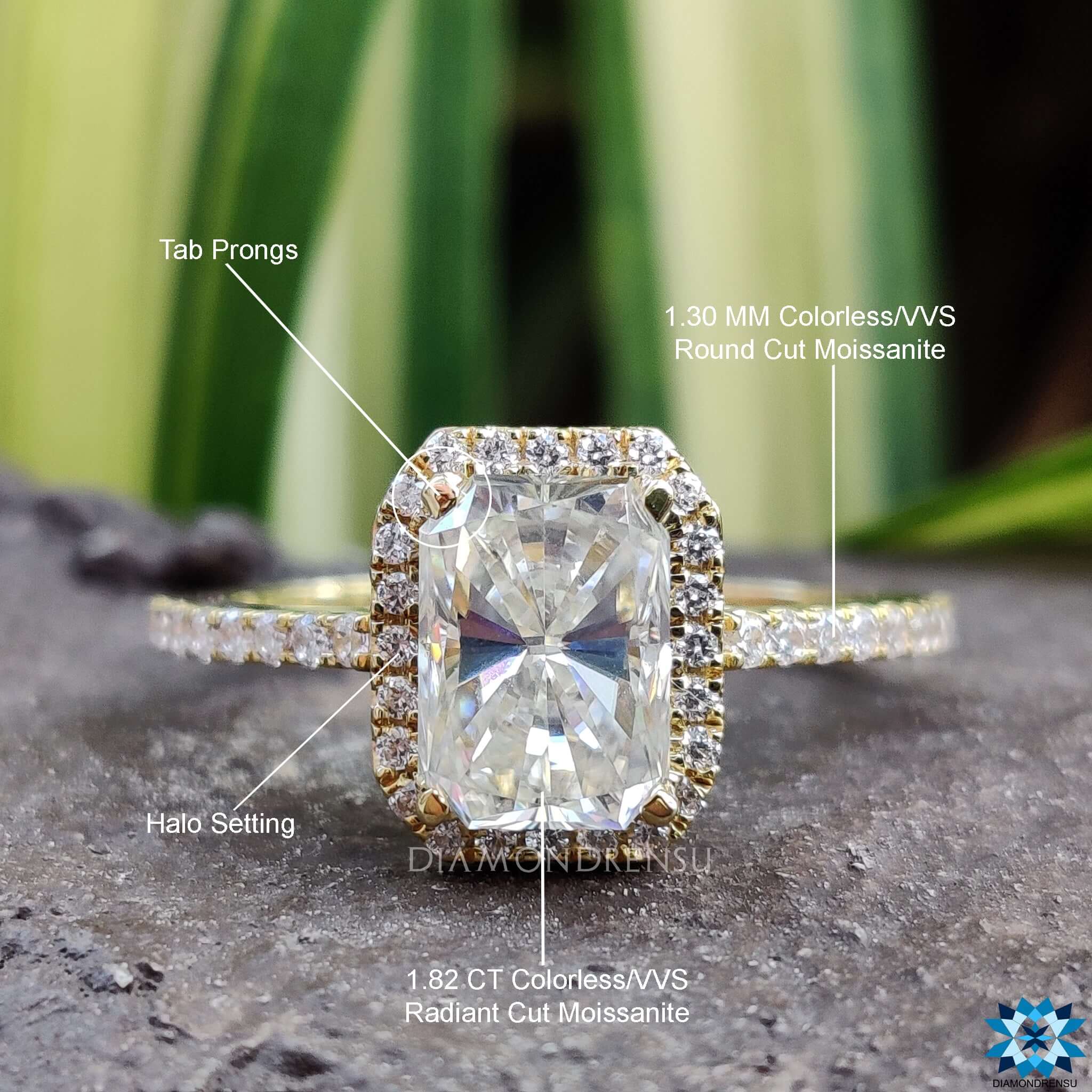 Moissanite ring UK featuring radiant cut stone in a halo ring setting.