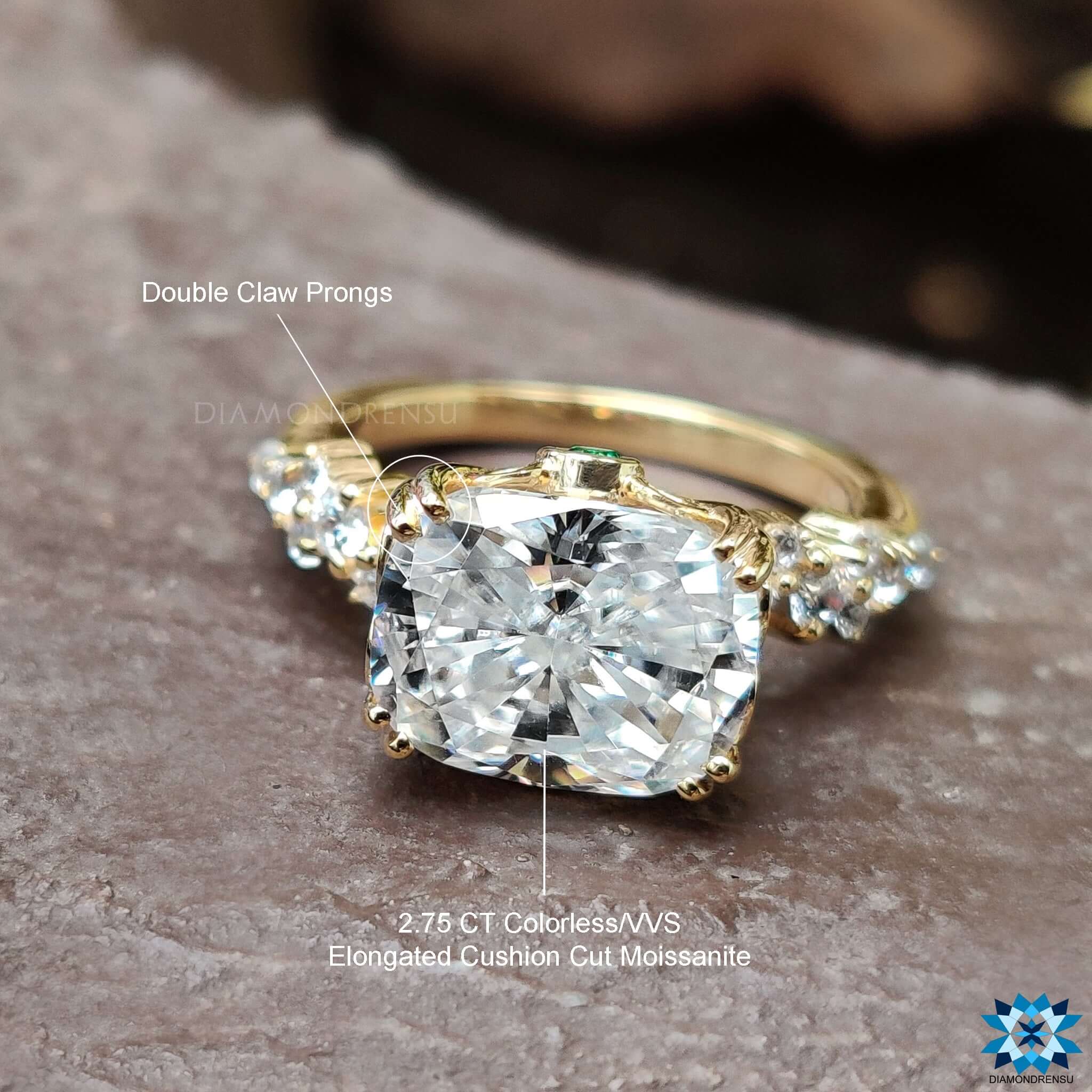 Shop to buy moissanite ring with a cushion cut centre and secure setting.