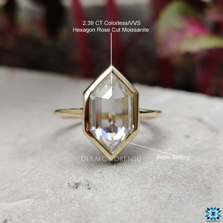 Elegant moissanite solitaire ring with hexagon cut design.
