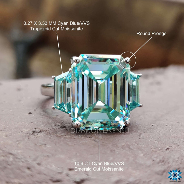 Trapezoid and emerald moissanite stones in classic layout.
