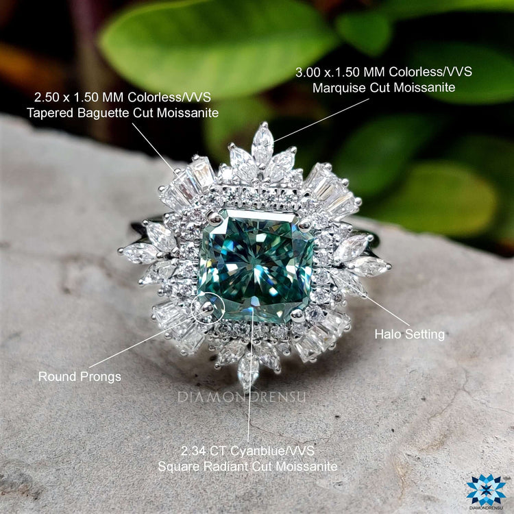 Vintage-inspired engagement ring with prong and halo setting.
