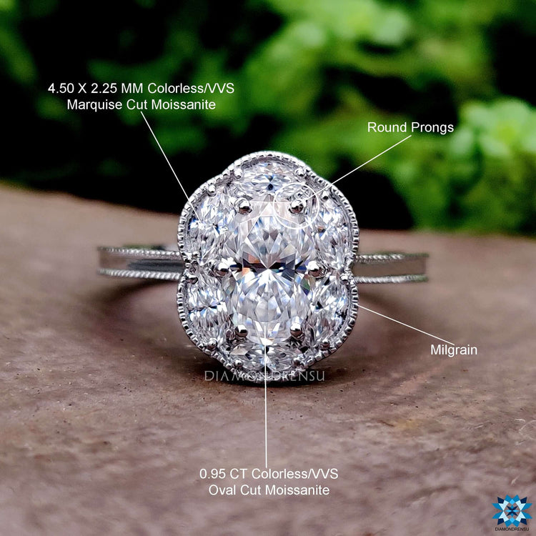 Vintage style moissanite engagement ring with halo setting.
