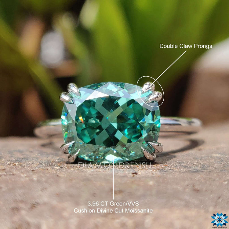 Custom engagement ring with green moissanite.

