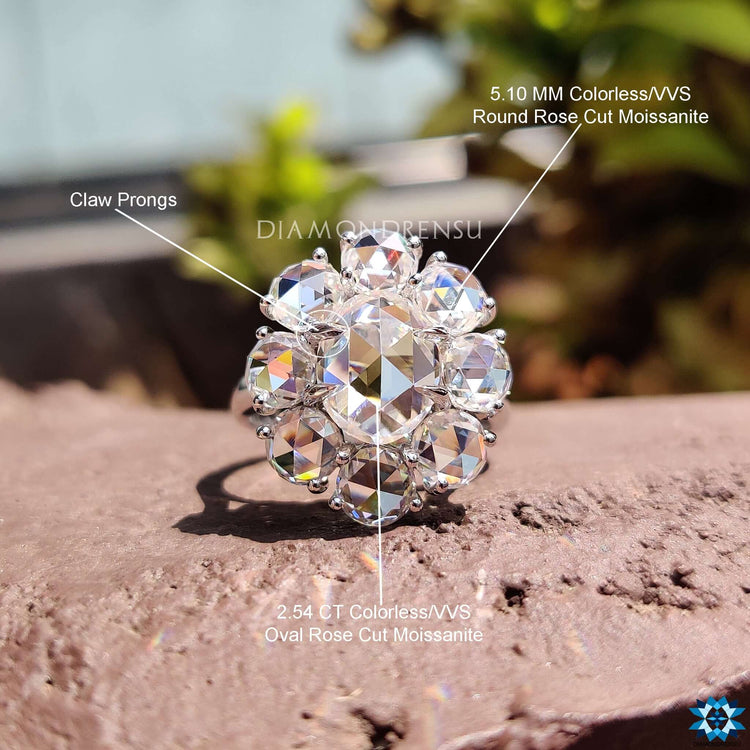 Unique floral style white gold engagement ring.
