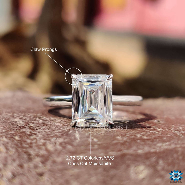 Criss cut moissanite solitaire ring handcrafted in white gold.

