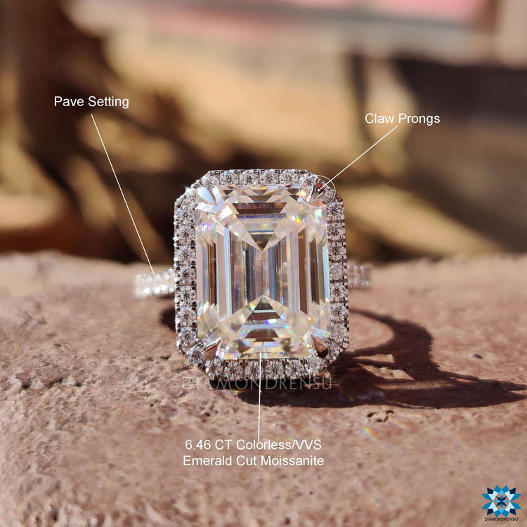 Pave setting engagement ring with emerald cut moissanite.
