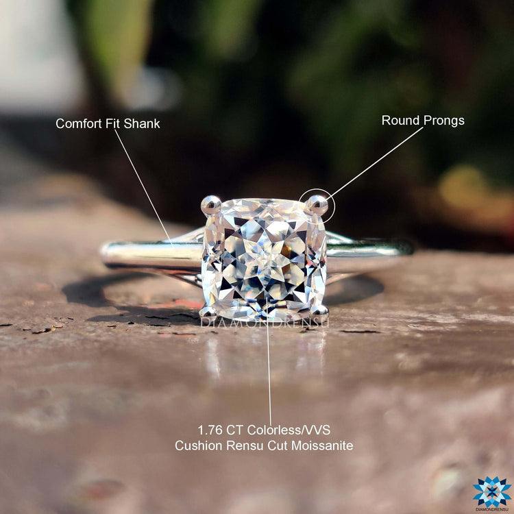 Four claw Cushion Rensu ring designed in a custom white gold setting.
