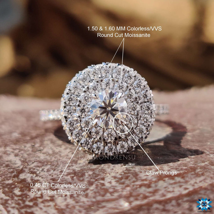 Handmade moissanite engagement ring with round cut stone.
