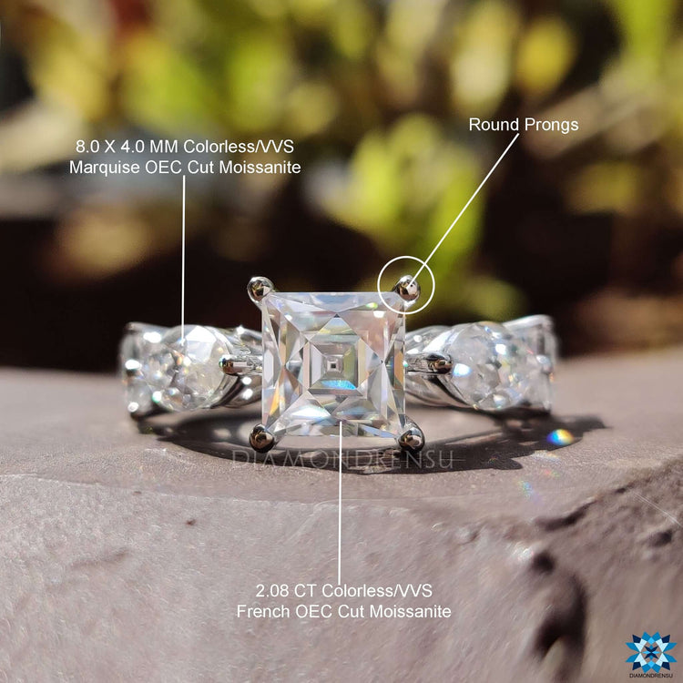 French old European cut center stone in prong setting.
