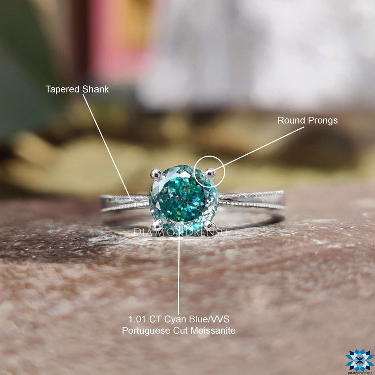 Tapered shank band on white gold ring.
