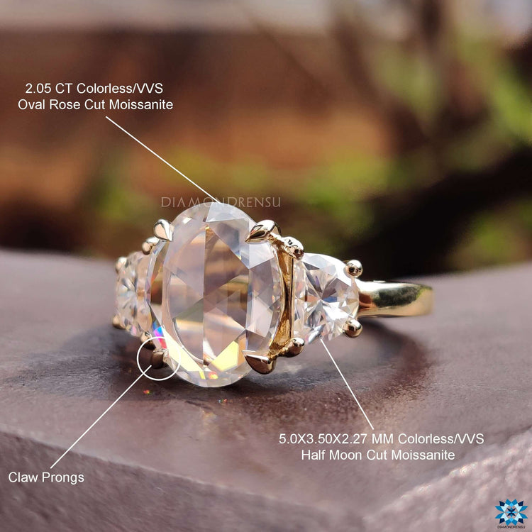 Moissanite 3 stone engagement ring.
