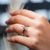 Elongated Hexagon Step Cut diamond featured in custom ring.
