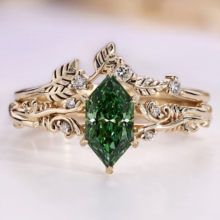 Bridal set with green Dutch marquise diamond and round side stones.