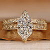 Bridal set with Dutch marquise diamond and solitaire style.