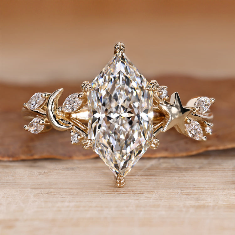 Dutch marquise ring with round and marquise side stones.