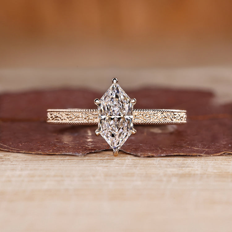 Dutch marquise lab grown diamond ring with milgrain details.