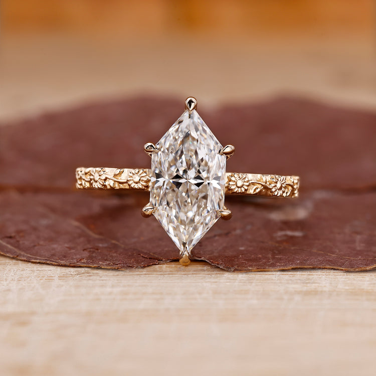 Dutch marquise diamond ring with nature inspired sunflower design.
