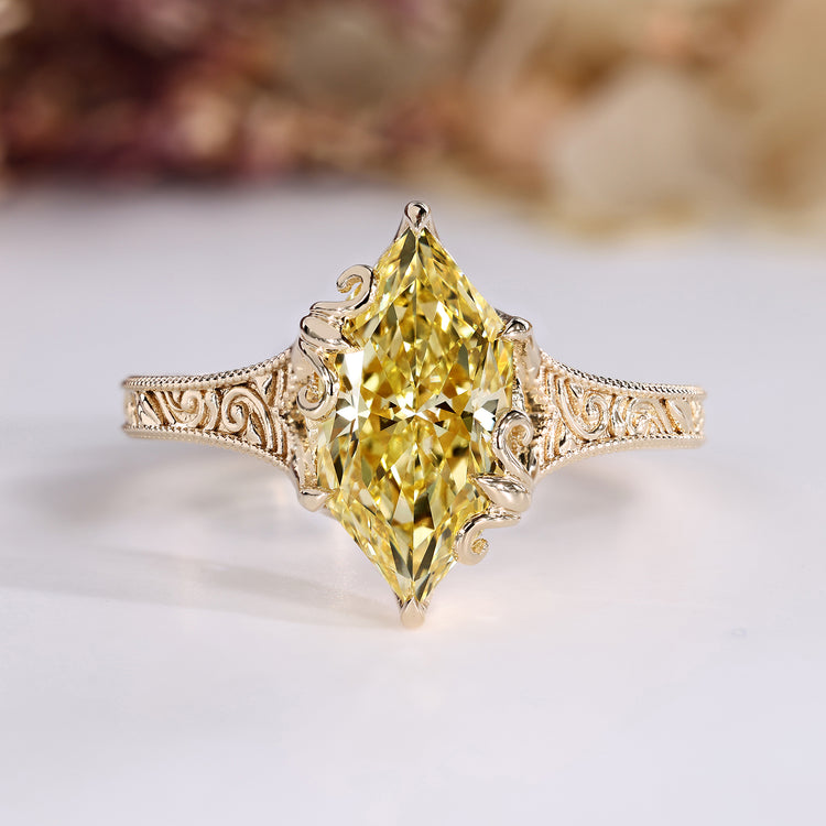 Art Deco engagement ring with yellow Dutch marquise cut diamond.