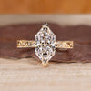 Dutch marquise lab grown diamond ring with milgrain details.