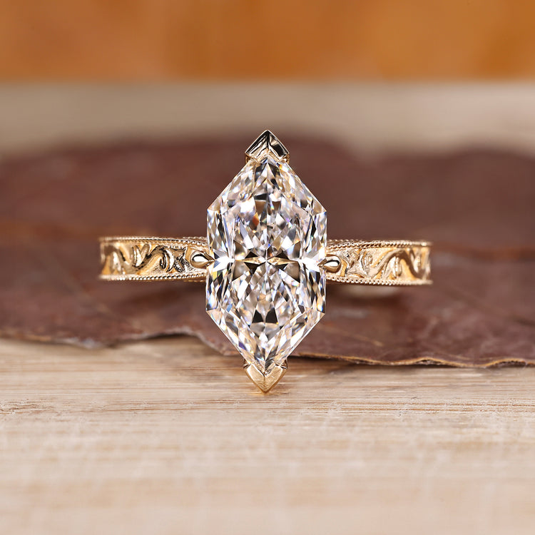Dutch marquise lab grown diamond ring with milgrain details.