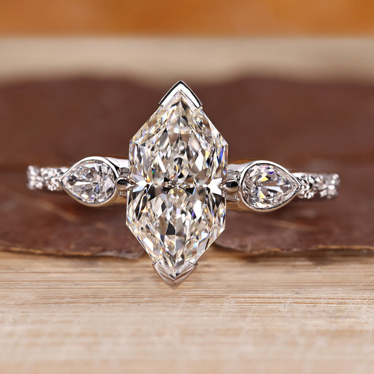 Dutch marquise ring with pear side stones handmade