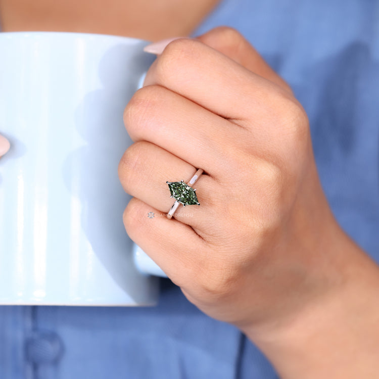 Handmade Dutch marquise ring with cathedral setting.