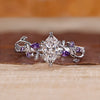 Nature inspired ring with dutch marquise diamond centre.