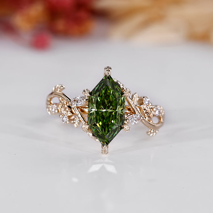 Dutch marquise engagement ring with green diamond and leaf details.