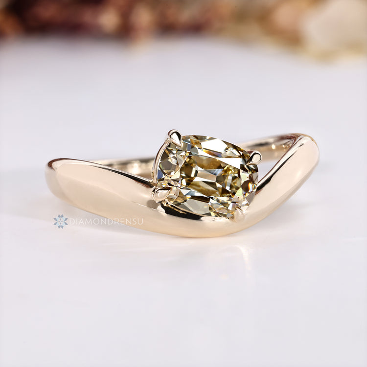Lab grown diamond ring with yellow cushion OMC cut.