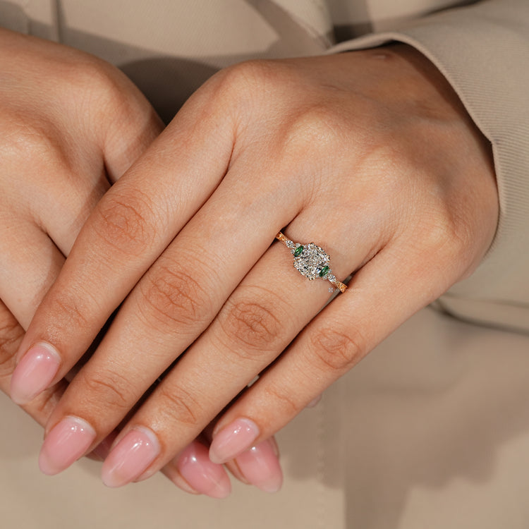 Handmade diamond ring with marquise and round side stones.
