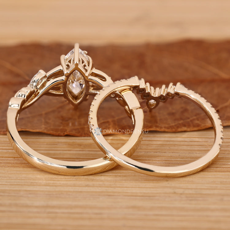 Marquise bridal set with twisted shank and v shape band.
