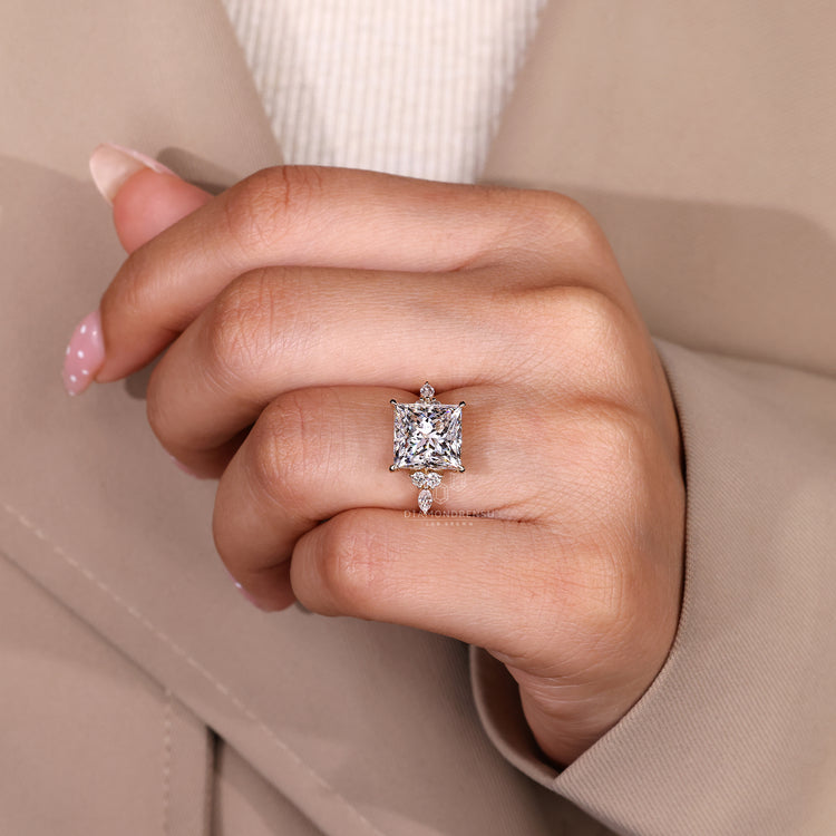 IGI certified princess cut engagement ring with side stones.