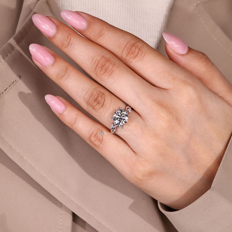 Round Cut Diamond Ring With Side Stone In Nature Inspired Style