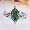 Dutch marquise engagement ring with green diamond centre stone.