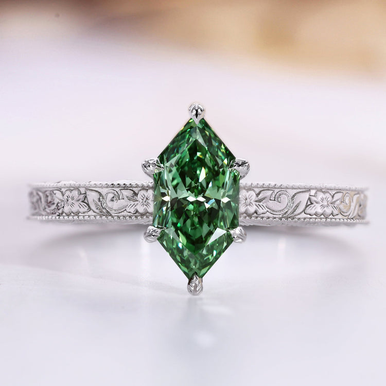 Dutch marquise cut ring with green diamond solitaire style.