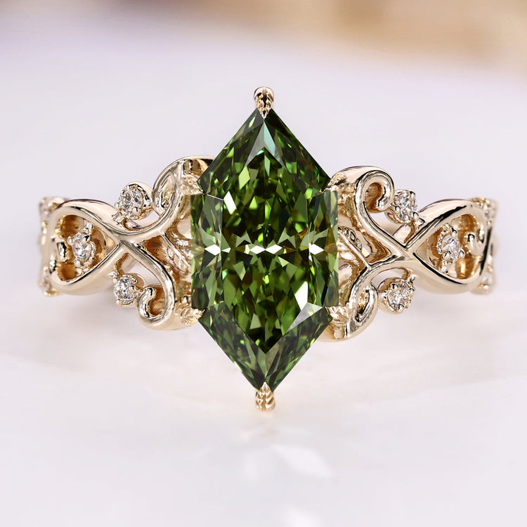 Dutch marquise engagement ring with green centre diamond.