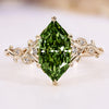 Dutch marquise ring with green centre diamond.