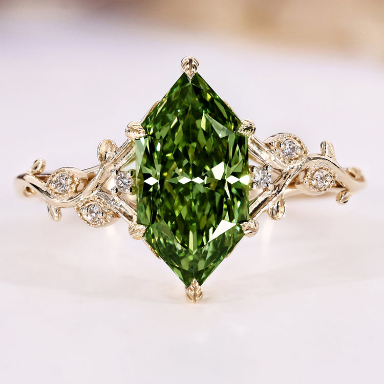 Dutch marquise ring with green centre diamond.