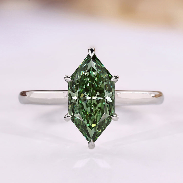 Dutch marquise engagement ring with green centre diamond.