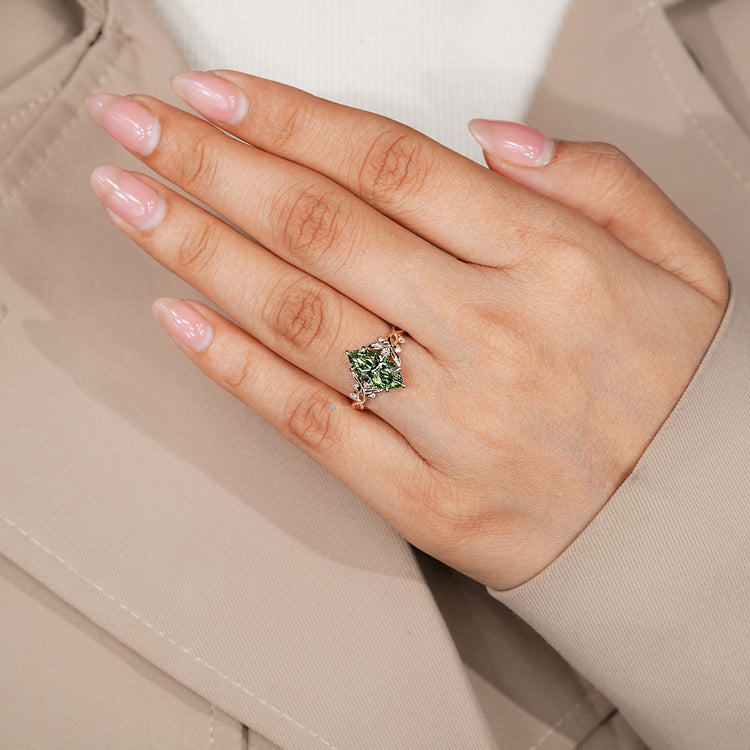 IGI certified marquise cut engagement ring with green diamond.