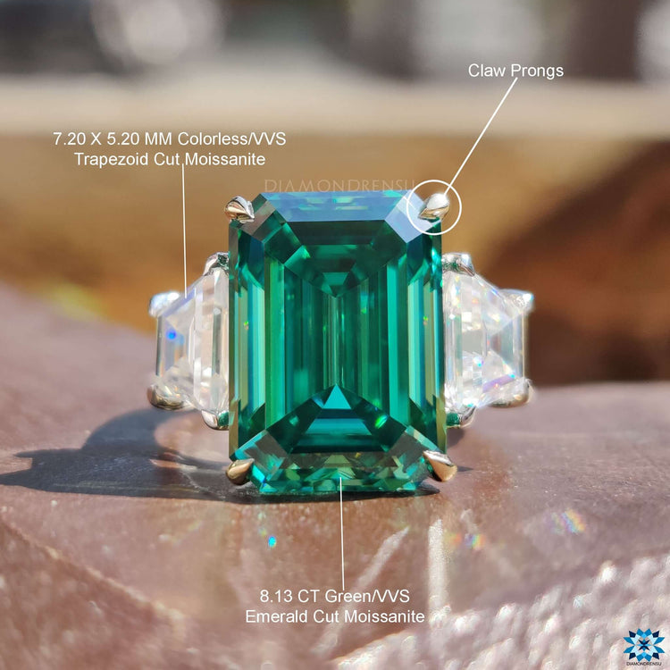 Diamondrensu UK green emerald cut engagement ring.
